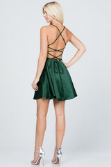 Satin like fit and flare dress with back crisscross spaghetti