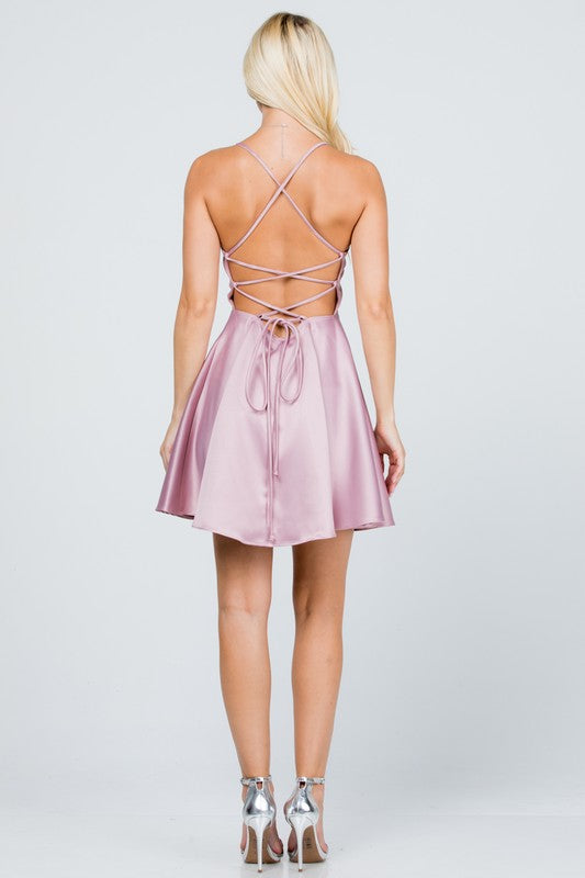 Satin like fit and flare dress with back crisscross spaghetti