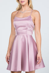 Satin like fit and flare dress with back crisscross spaghetti