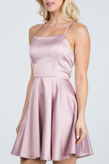 Satin like fit and flare dress with back crisscross spaghetti