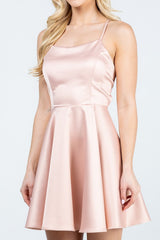 Satin like fit and flare dress with back crisscross spaghetti