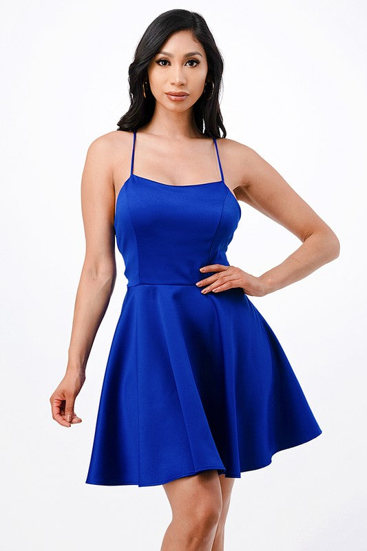 Satin like fit and flare dress with back crisscross spaghetti