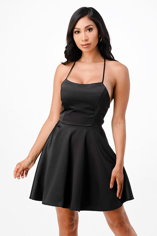 Satin like fit and flare dress with back crisscross spaghetti