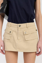 LOW WAIST DENIM MINI SKIRT WITH FRONT POCKETS