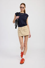 LOW WAIST DENIM MINI SKIRT WITH FRONT POCKETS